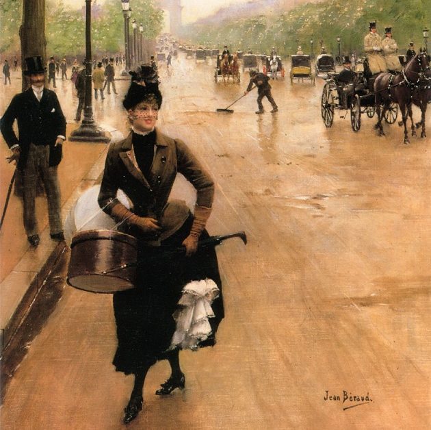 woman crossing the champs elysees avenue