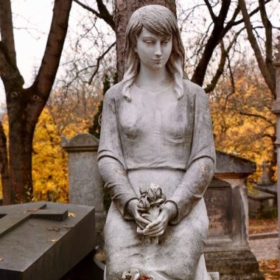 Pere Lachaise cemetery statue of a young girl